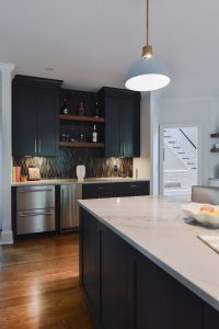 Custom Bar build with custom remodeled kitchen in the foreground.